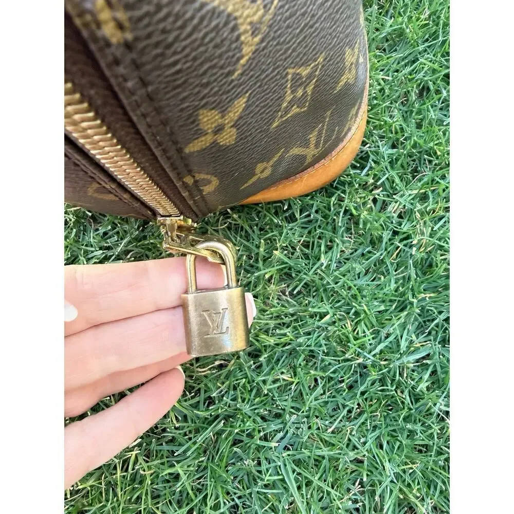 Louis Vuitton Alma Monogram Canvas Handbag Vintage Authentic Lock